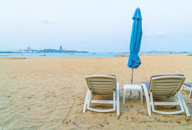 beach chair with umbrella on sea beach at Pattaya