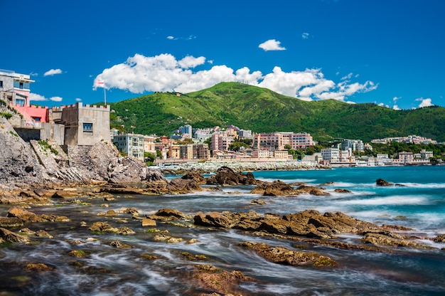 Beach, cliff and fishing village of Vernazzola near the center of Genoa, on the italian Riviera