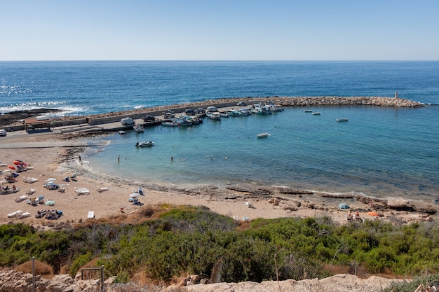 Beach and harbour at Cape Deprano Cyprus