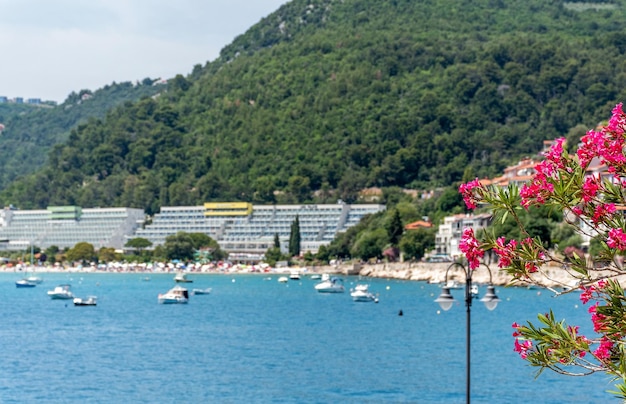 Beach and hotels on adriatic sea coast in rabac croatia