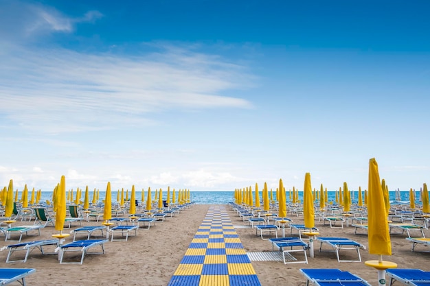 Beach resort with sun beds and beach umbrellas