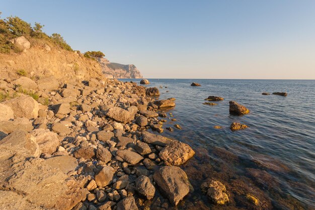 Beach between rocks and sea Black Sea Ukraine