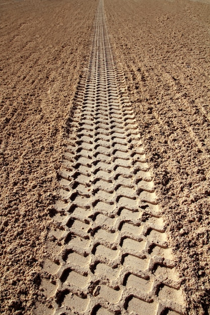 Beach sand tyres footprint perspective to infinite