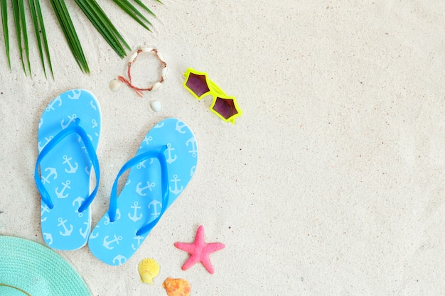 Premium Photo | Beach sand with bracelet made of seashells