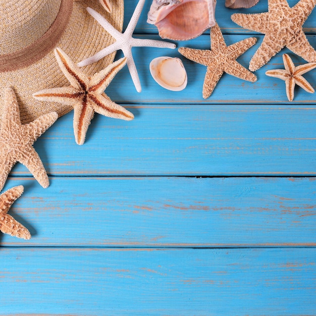 Premium Photo | Beach summer starfish background blue wood