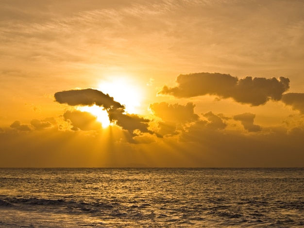 beach at sunrise time, gold color