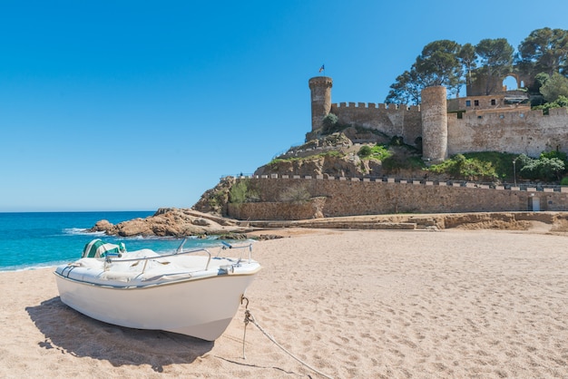 Beach at Tossa de Mar and fortress in a beautiful summer day, Costa Brava, Catalonia, Spain