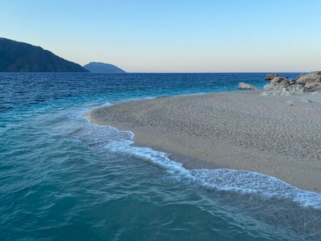 Beach and tropical sea with clear water