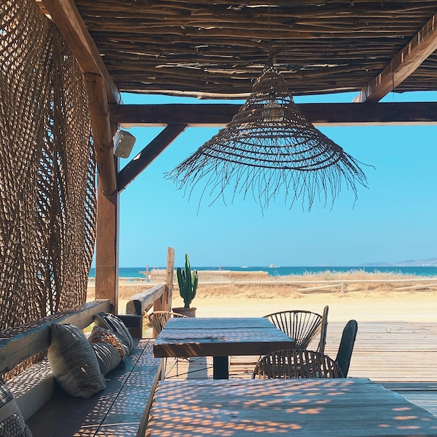 Photo beach view from beach bar with boho decor