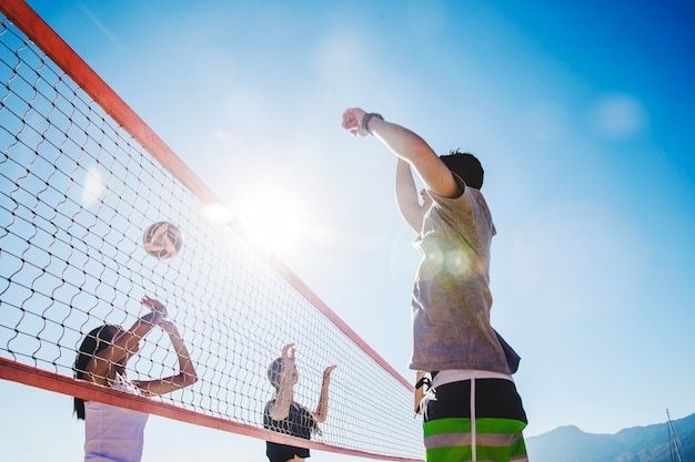 Photo beach volleyball scene with bokeh effect