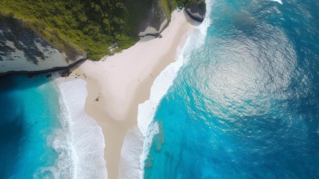 A beach with a blue ocean and a cliff in the background