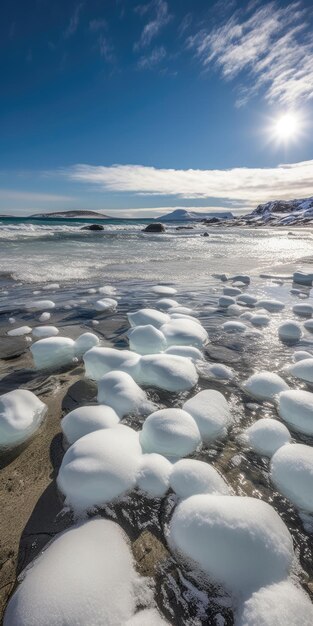 A beach with ice floes and a blue sky