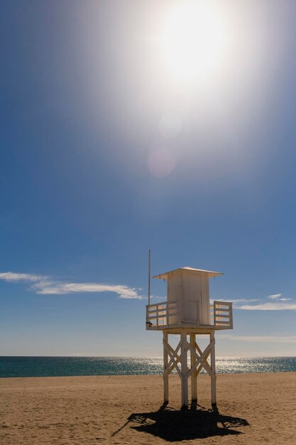 Beach with lifeguard hut all ready for summer No people