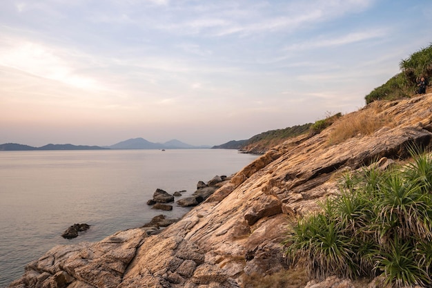 A beach with a mountain in the background