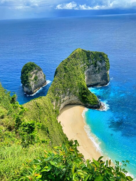 A beach with a sandy beach and a blue ocean.