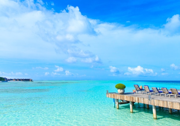 Beach with water bungalows at Maldives