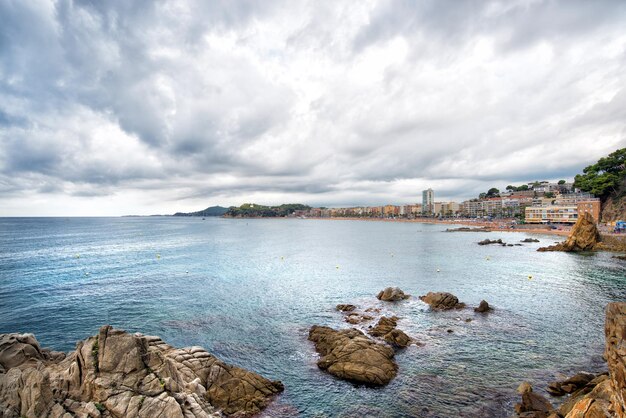 The beaches in Lloret de Mar in cloudy weather. Spain