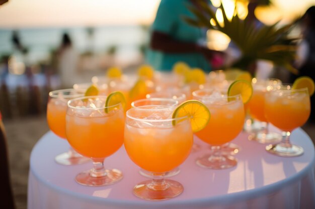 Photo a beachside wedding reception with elegant glasses of rum punch