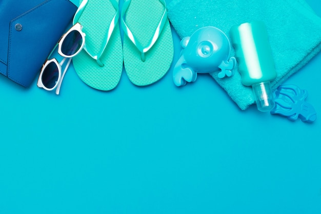 Beachwear and accessories on a blue background