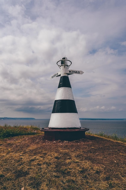 Photo beacon with the pointer on the hill