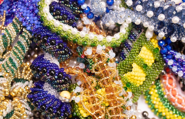 Bead jewelery on white background.