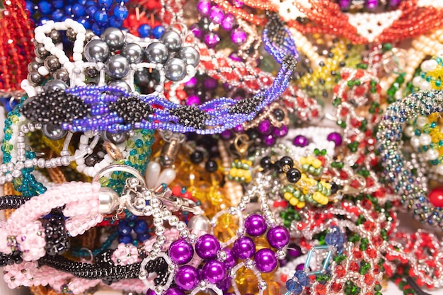 Bead jewelery on white background.