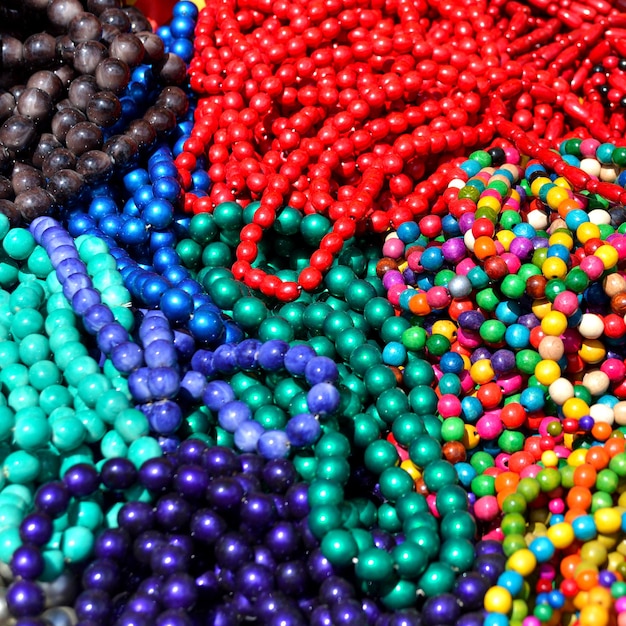 Photo beads colorful beautiful texture. flat lay, top view. red, pink, yellow, blue, green