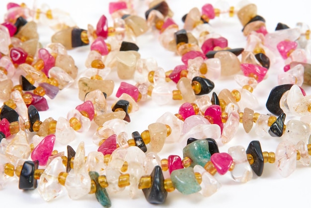 Photo beads of different stones on a white background