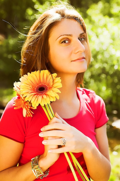 Beaituful woman with gerber