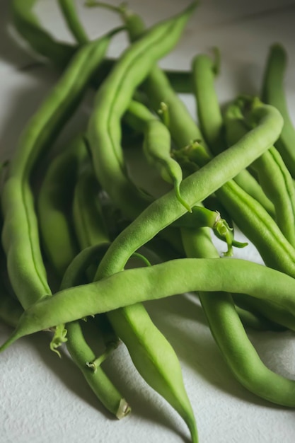 Photo bean asparagus closeup healthy legumes in summer are green bean asparagus a lot of asparagus legumes