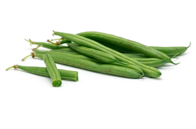 Bean pods on white wall