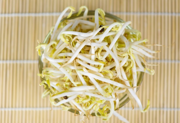 bean sprouts cup on wooden , top view 