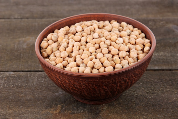 Beans in bowl on wooden