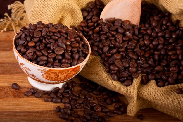 Beans of coffee on a bowl