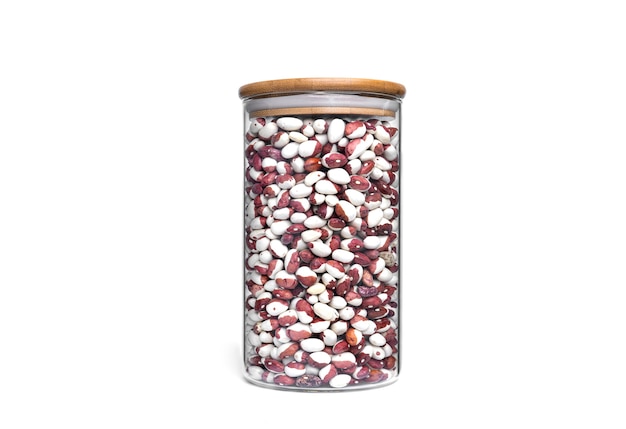 Beans in a glass jar isolated.