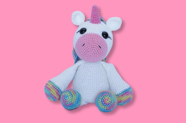 bear unicorn wool strings white background