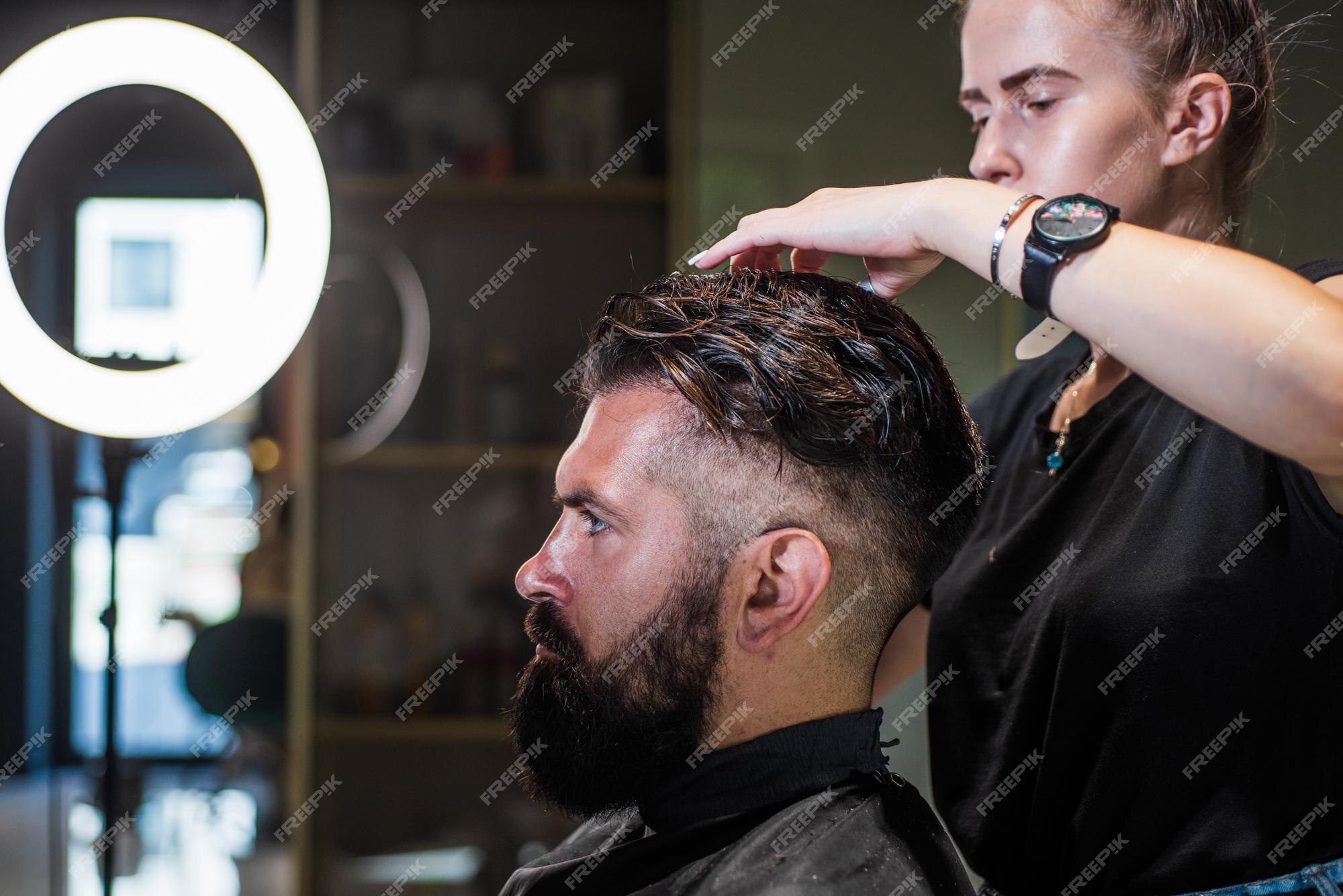 Premium Photo | Beard correction in barbershop salon by master for hipster hair fashion Premium Photo | Beard correction in barbershop salon by master for hipster hair fashion