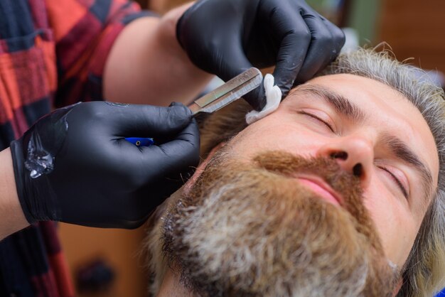 Beardcare procedures barbershop advertising professional beard care hairdresser salon for men close