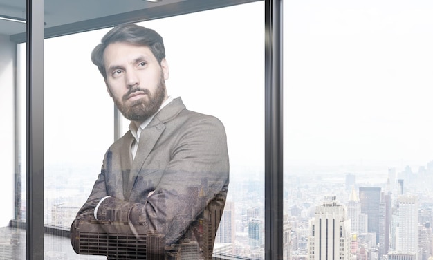 Bearded businessman dreaming of being the monopolist in his niche