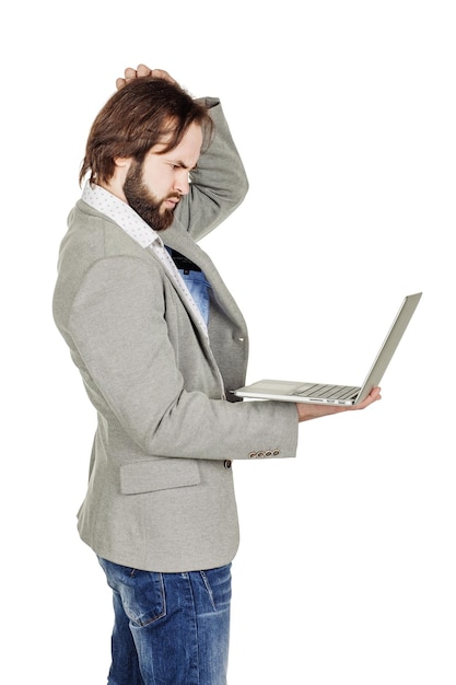 Bearded businessman with laptop computer human emotion expression and office business technology finances and internet concept image isolated white background