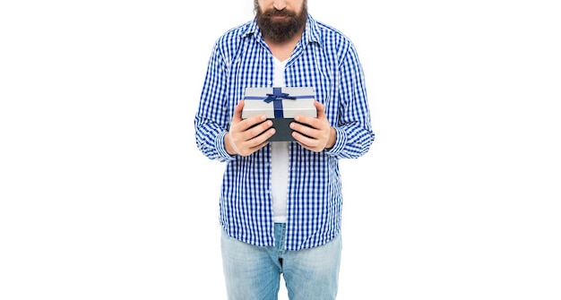 Bearded guy hold present box for Valentines day Happy birthday Mens day Man with gift isolated on white Romantic gift for anniversary Present for mens day Bonus reward of man Cropped view