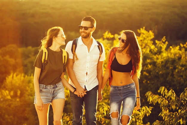 Bearded handsome man with girls