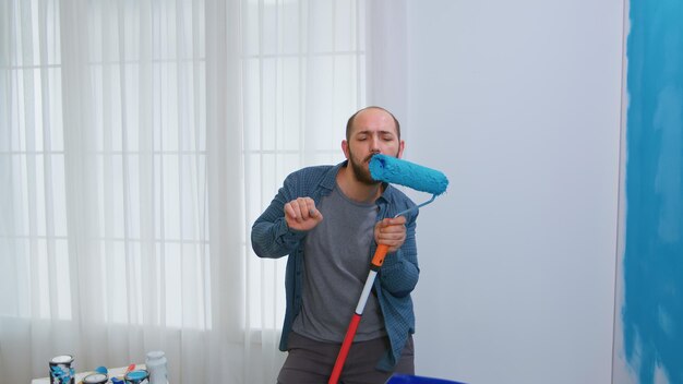 Bearded handyman singing person