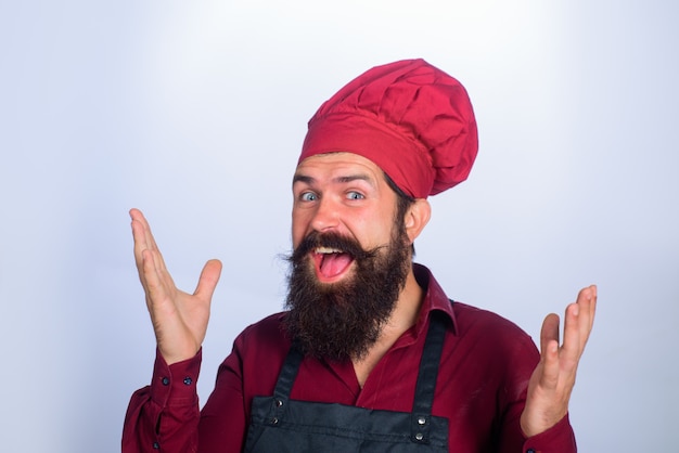 Bearded male cook professional chef man happy bearded chef cook or baker male chef in uniform