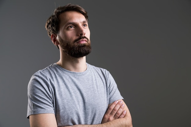 Bearded male crossed arms