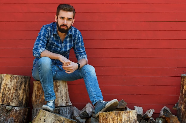 Bearded man in checkered shirt