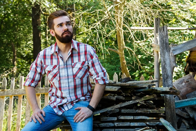 Bearded man in checkered shirt