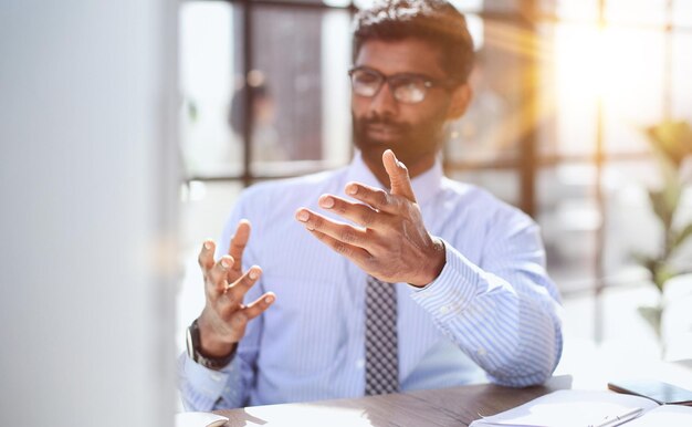 Bearded man emotionally spreads his hands Question what's going on or why