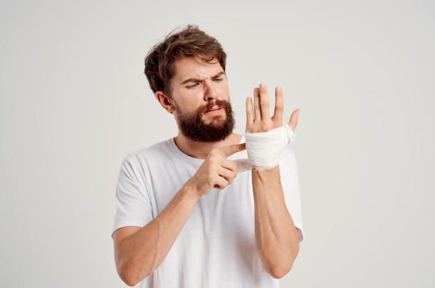 Bearded man hand injury treatment health problems emotions
hospital medicine