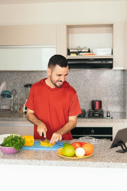 Bearded man making a video conference from his home kitchen